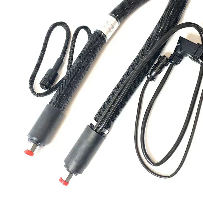 Black insulated hot melt adhesive hoses with electrical connectors and protective mesh covering.